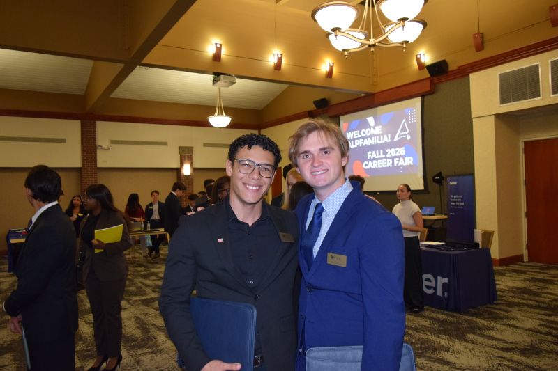 Christian with a fellow member at the ALPFA UCF Career Fair