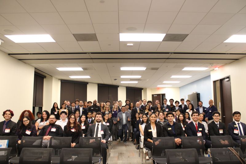 Large group of students at a Charles Schwab event